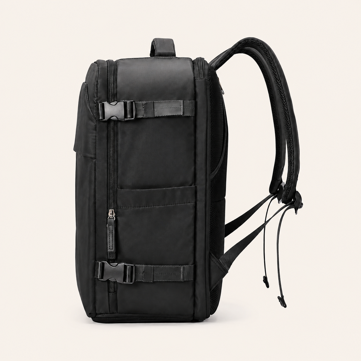 A black LEVARE travel backpack with dual adjustable compression straps and a top carry handle, shown from the side against a light cream background.